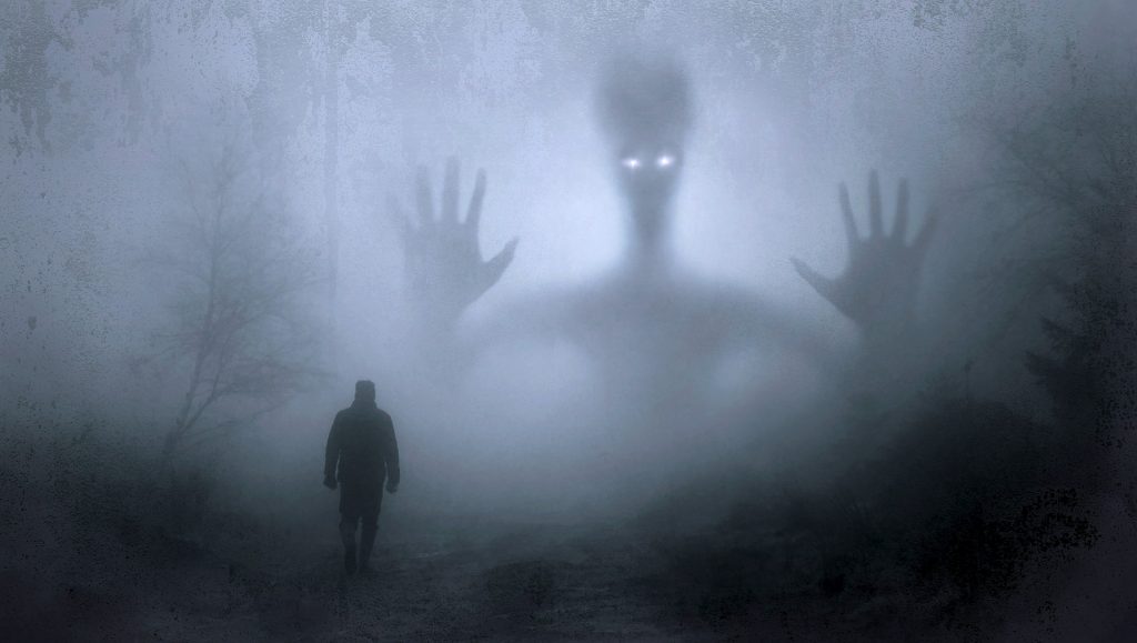 The silhouettes of a man and an alien/the two identities of Jeffrey Lash