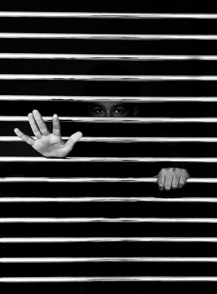 black and white photo of prisoner