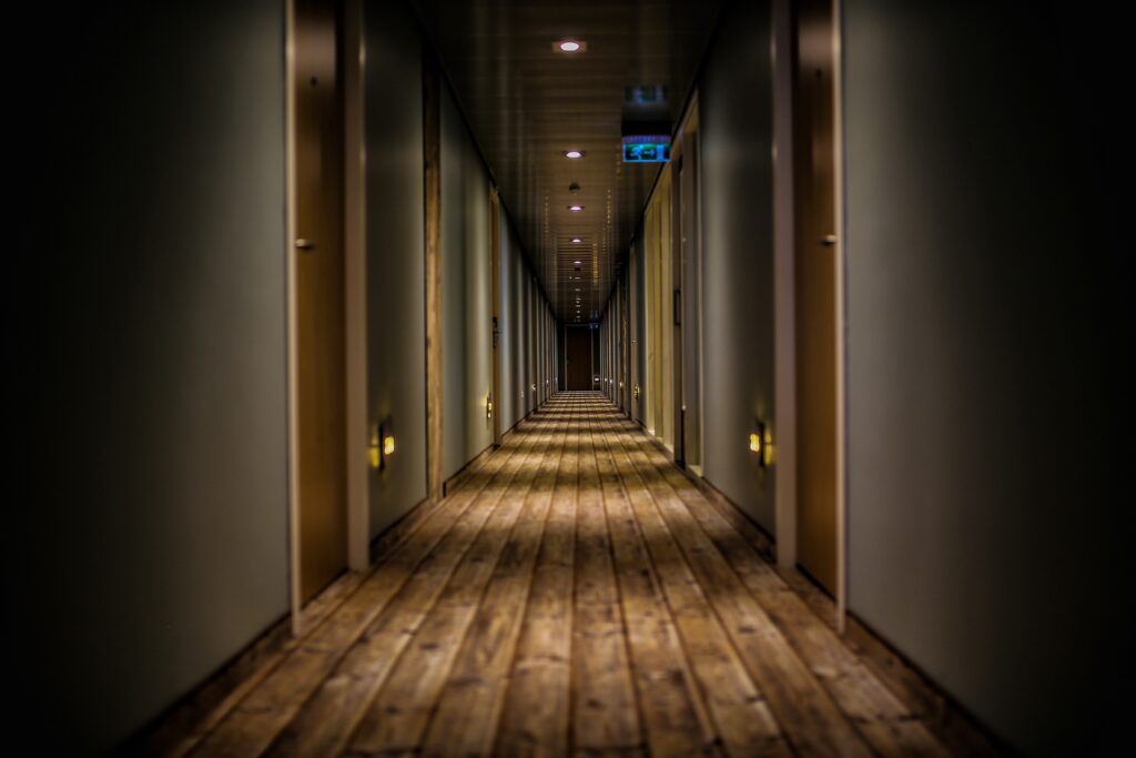 Another spooky hotel corridor much like one you'd see at one of the haunted hotels listed in this article.